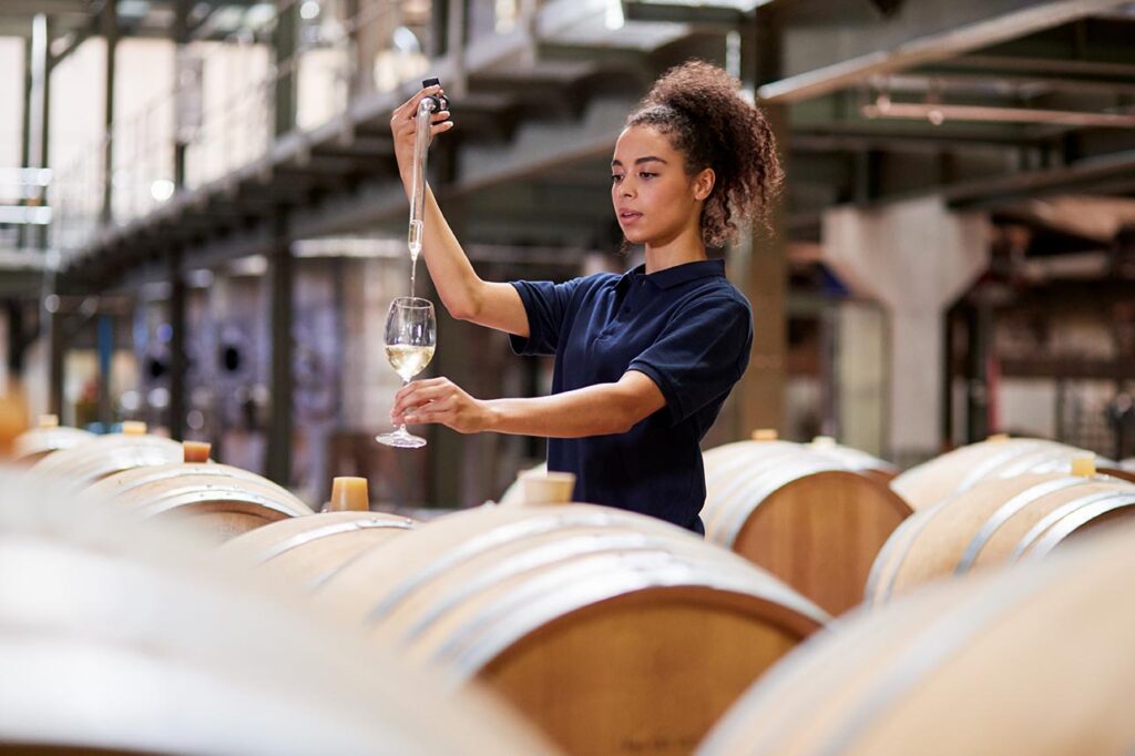 Women making wine